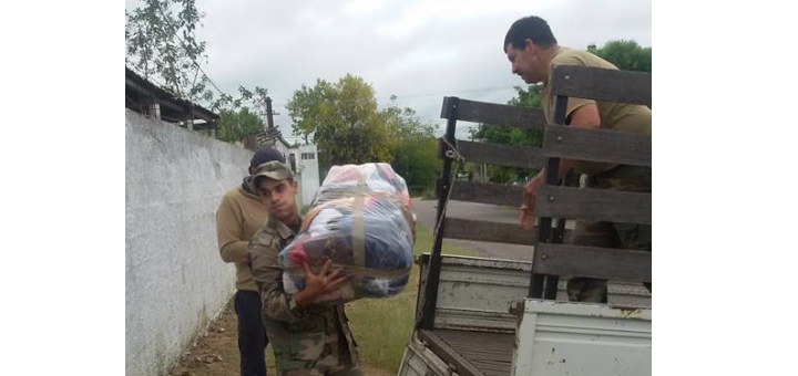 entrega de donaciones a treinta y tres